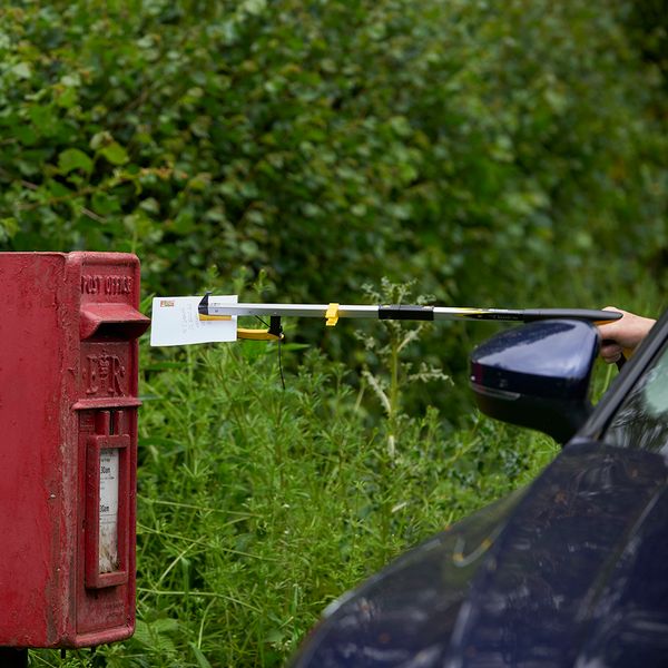 Posting a letter with the Classic Pro Folding Reacher