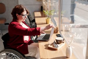 Lady in a wheelchair at desk